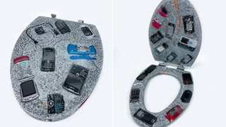 This bizarre toilet seat decorated with retro phones goes on sale for whopping $1,260
