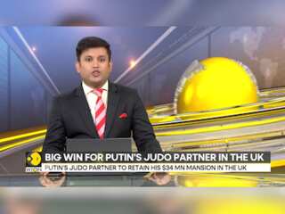 Putin's judo partner wins court battle with ex-wife