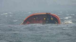 Philippine coast guard says oil inside sunken tanker has started to leak into Manila Bay