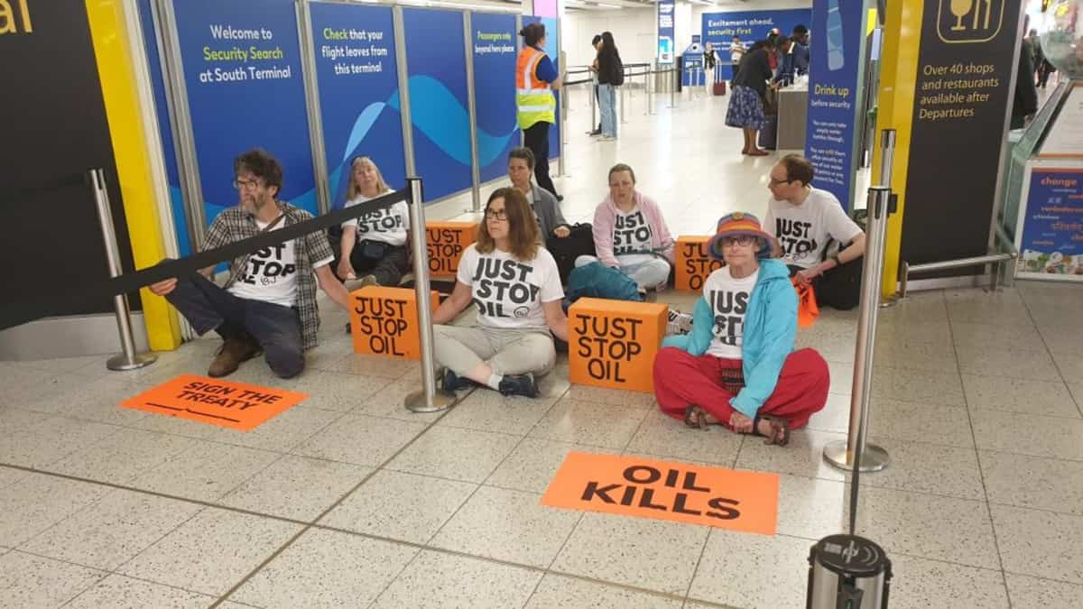 Just Stop Oil protesters enter Gatwick Airport, block departure gates Just Stop Oil protesters enter Gatwick Airport, block departure gates