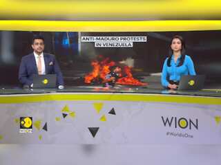 Venezuela Protests: Demonstrators tear down statue, hurl objects at authorities