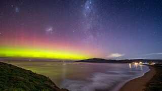 Auroras dazzle skies of Australia, US and the UK after powerful solar storms slam Earth