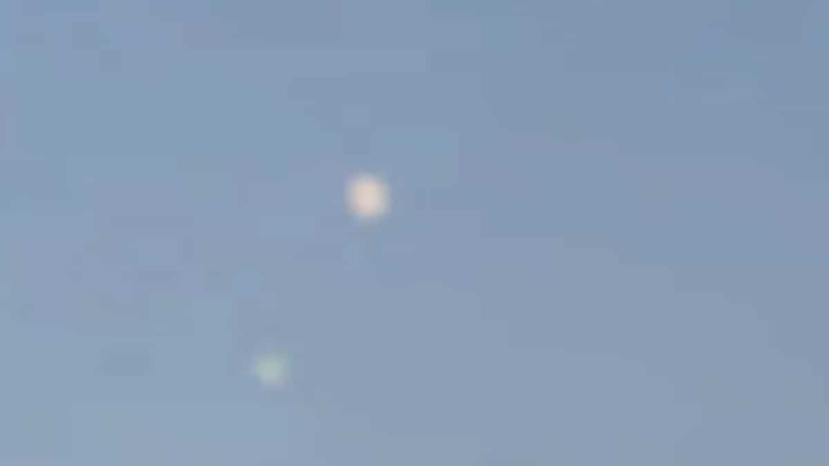 UFO hovering in Spain? Tourists spot mysterious disc flying for seconds in sky