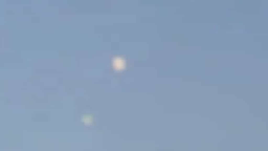 UFO hovering in Spain? Tourists spot mysterious disc flying for seconds in sky