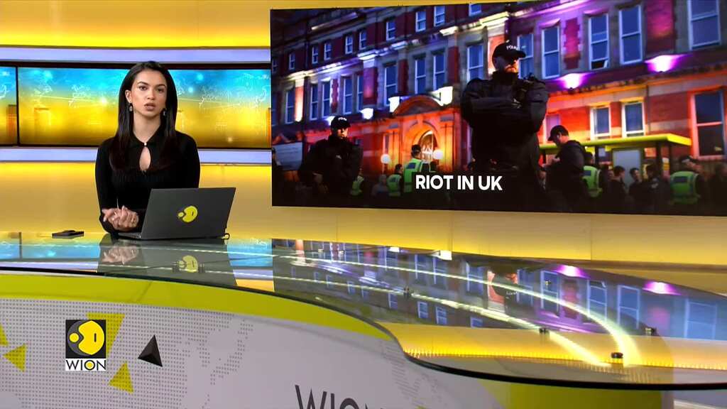 Three officers injured, eight arrested after UK riot