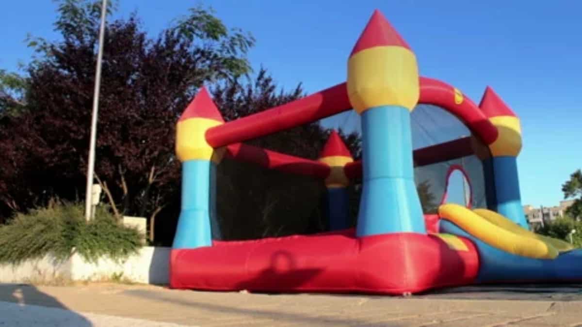 US boy dies after strong winds lift a bouncy castle into air US boy dies after strong winds lift a bouncy castle into air