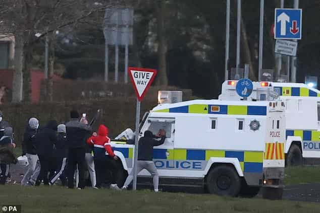 UK violence: 400 arrested, man assaulted in Belfast hate crime; police attacked with petrol bombs