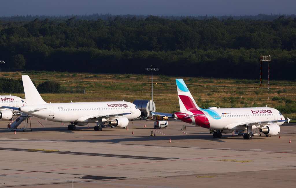 ‘Stupid’ climate activists halt operations at German airports after breaking in