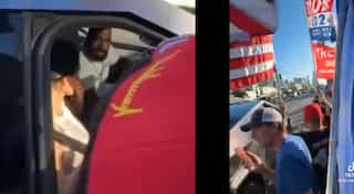 Fans cheer for Kanye West as he visits pro-Trump rally in Tesla cybertruck with Bianca Censori