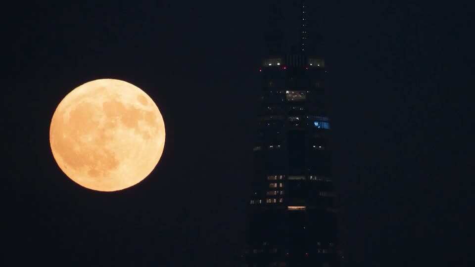 The Seoul night sky shone brightly with a rare blue supermoon