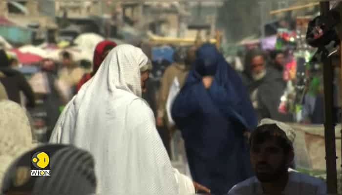 Taliban issue a ban on women’s voices and bare faces in public