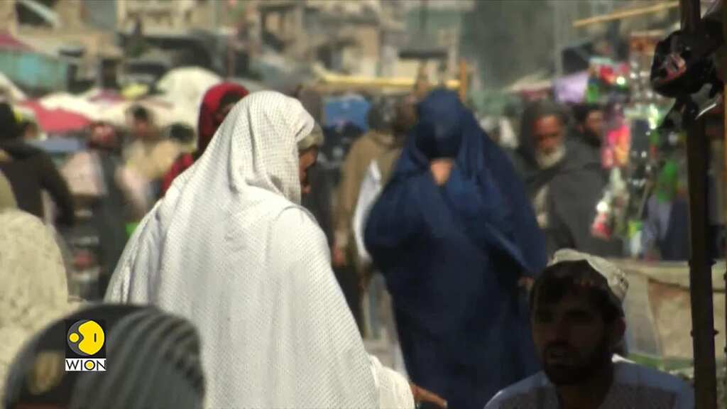 Taliban issue a ban on women’s voices and bare faces in public