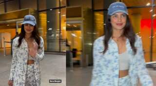 Priyanka Chopra is all smiles as she pays a surprise visit to India; watch