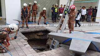 VIDEO: Indian woman falls into 8-metre-deep sinkhole in Kuala Lumpur