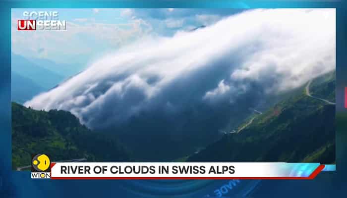 Thick, voluminous clouds descend on Swiss Alps