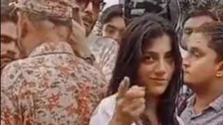 Video: Pakistani woman smiles after crushing two people with SUV