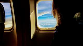 Women snatch crying child from granny, lock her in toilet during a flight in China