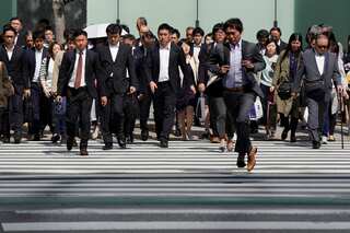 Japan pushes for four-day work week to boost declining birth rate