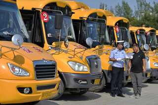 China: 11 dead after bus crashes into students, parents at school gate