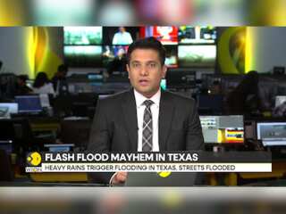 Texas floods: Floodwaters trigger rescues and road closures