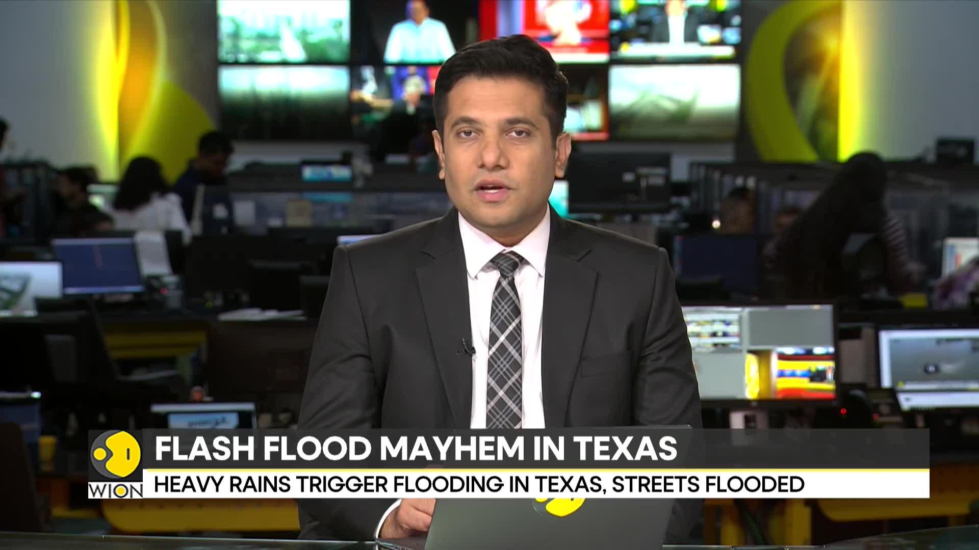 Texas floods: Floodwaters trigger rescues and road closures