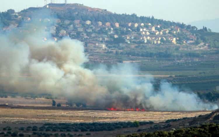 Israel targets Hezbollah weapons' sites in overnight strikes; group fires rockets at Israeli military base