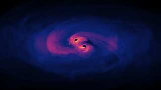 Two supermassive black holes are scary close and set to crash. Here's what will happen next