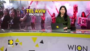 Israel-Hamas war: Hostage families chain themselves to bridge in protest