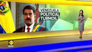 Venezuela: President Maduro displays gun on television
