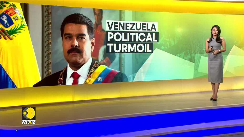 Venezuela: President Maduro displays gun on television