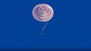 Russian capsule Soyuz carrying 2 Russians, one American returns to Earth from space station