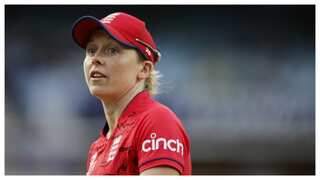 Truly sorry: England captain Heather Knight reacts after being handed suspended fine over racist photo