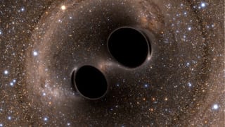 Two galaxies with two black holes each caught in the act of merging by Chandra