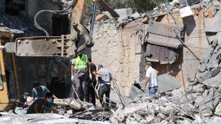 Lebanon’s state-run news agency claims Israeli airstrike killed around 23 Syrian workers and kin