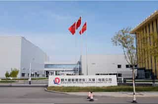 Evergrande's EV unit in talks for stake sale amid financial struggles