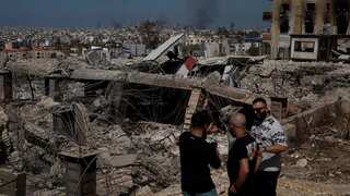 Israel calls for evacuation in south Lebanon as it hits Hezbollah targets in Beirut suburbs