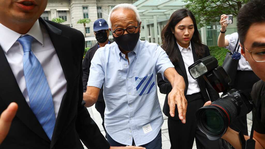 Singapore charges billionaire linked to ex-transport minister's case
