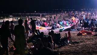 Dubai’s floodlit night beaches get popular amid rising heat