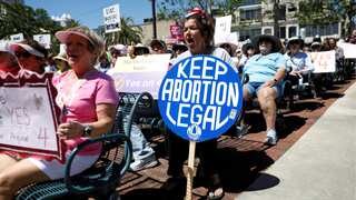 Georgia supreme court restores six-week 'heartbeat' abortion ban; White House slams decision