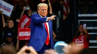Trump pauses mid-rally to compliment a female supporter, remarks about 'politically correct culture'