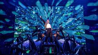 How does Michael Jackson continue to dominate the globe even after passing away?