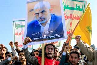Israel drops leaflets over Gaza showing Sinwar's dead body as Palestinians mourn the defiant 'hero'