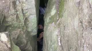 Australia: Woman drops her phone between boulders, gets stuck trying to retrieve it