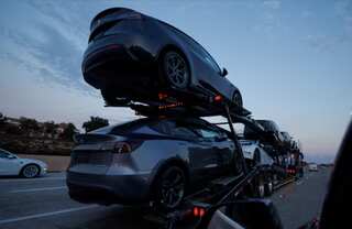 Tesla stock surges on strong growth outlook