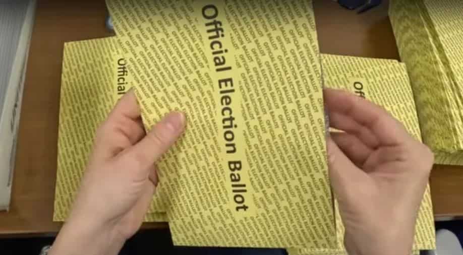 US officials blame Russian actors for ‘fake’ video showing man destroying mail-in ballots
