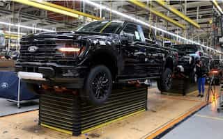 Ford cuts profit outlook as price war pressures earnings; shares decline