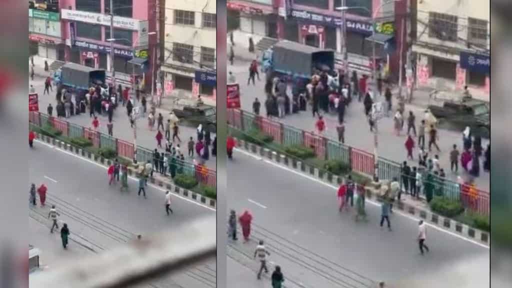 Factory workers protest in Dhaka’s Kachukhet over unpaid wages, set police van on fire