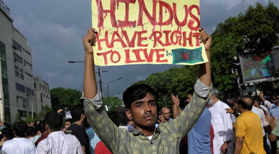 Bangladesh: 19 Hindus booked under sedition laws for hoisting saffron flag, demanding protection Bangladesh: 19 Hindus booked under sedition laws for hoisting saffron flag, demanding protection