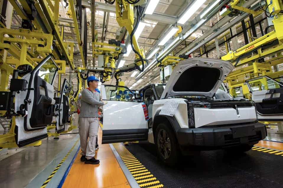 China urges France to help broker compromise on EV trade dispute with EU