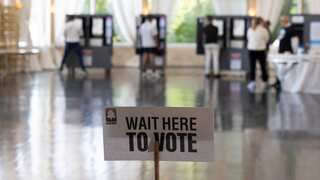 US election: 19-year-old first-time voter becomes last to cast ballot in Georgia
